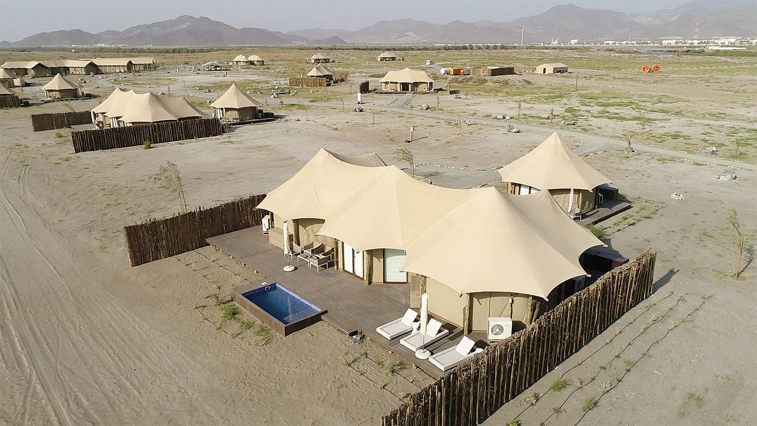 Aerial of glamping tent cabin resort in the desert